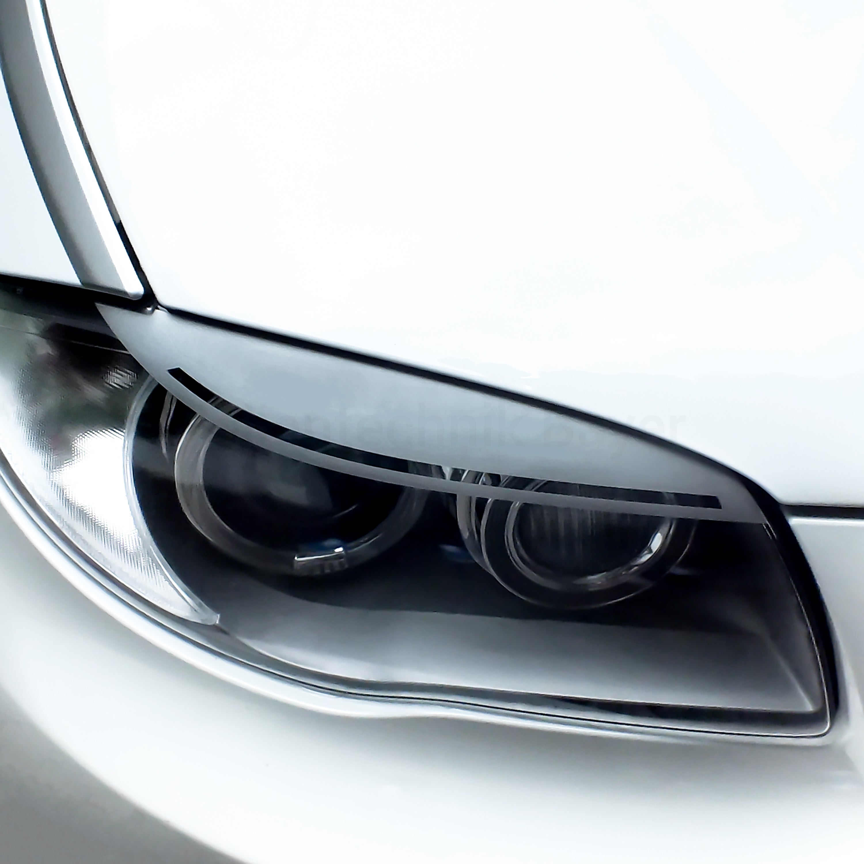 LCI Scheinwerferblenden für BMW 1er e81 e82 e87 e88 – 2-teiliges Folienset, Tuning Aufkleber, Böser Blick, passgenau, selbstklebend & wetterfest